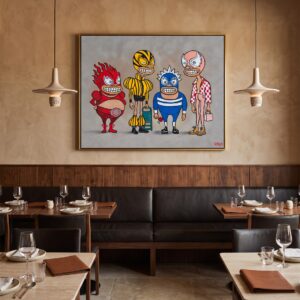 Luchadores original painting above a black leather restaurant banquette, with pottery pendant lights and set dining tables.