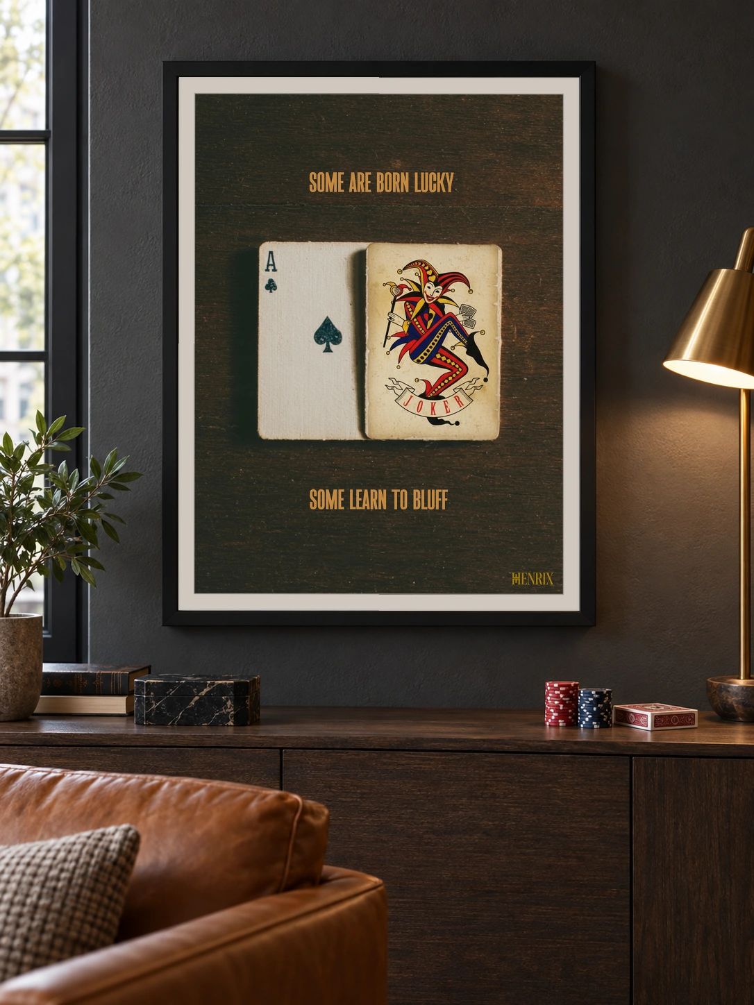 Lucky Bluff print, 18 × 24 inch, black frame above a wood console in a dark lounge