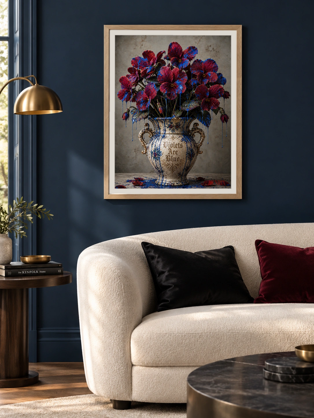 Violets Are Blue print, 18 × 24 inch, Natural Wood frame above a cream sofa on a dark blue wall