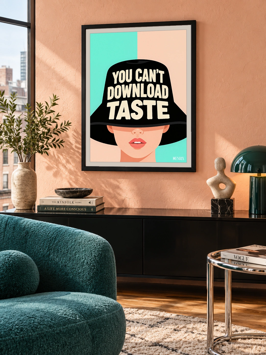 You Can't Download Taste print, 18 × 24 inch, black frame above a console with teal living-room seating