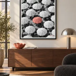 You Were Never Meant to Blend In print, 30 × 40 inch, black frame above a sideboard beside a charcoal chair