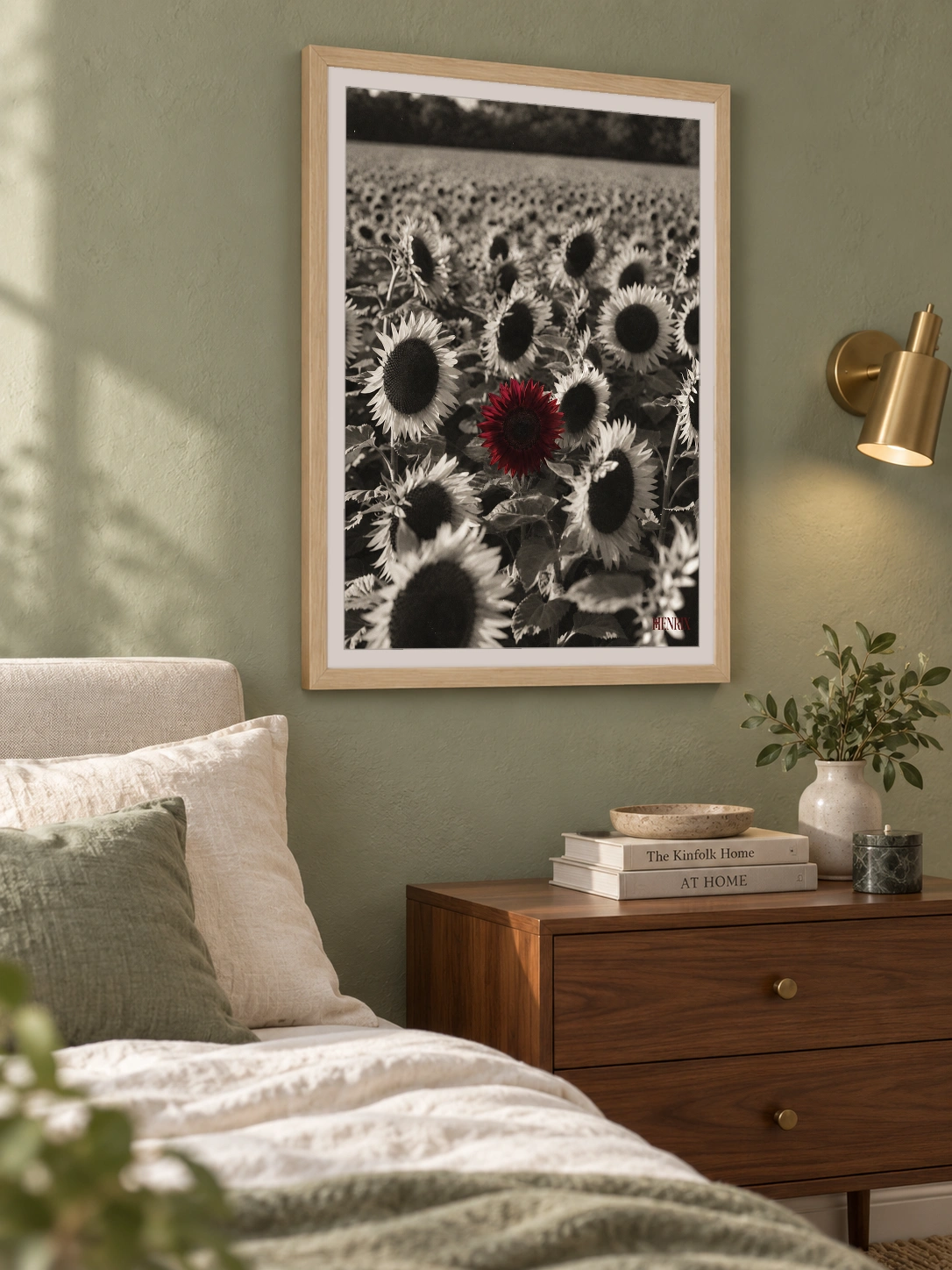 Grow Your Own Way print, 18 × 24 inch, Natural Wood frame above a bedside cabinet on a sage wall, viewed from the side