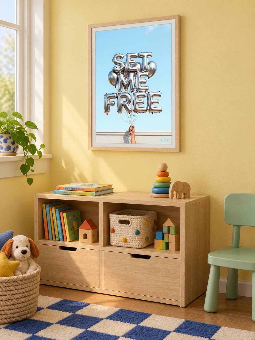 Set Me Free print, 18 × 24 inch, Natural Wood frame above shelves and toys in a yellow children’s room, viewed at an angle