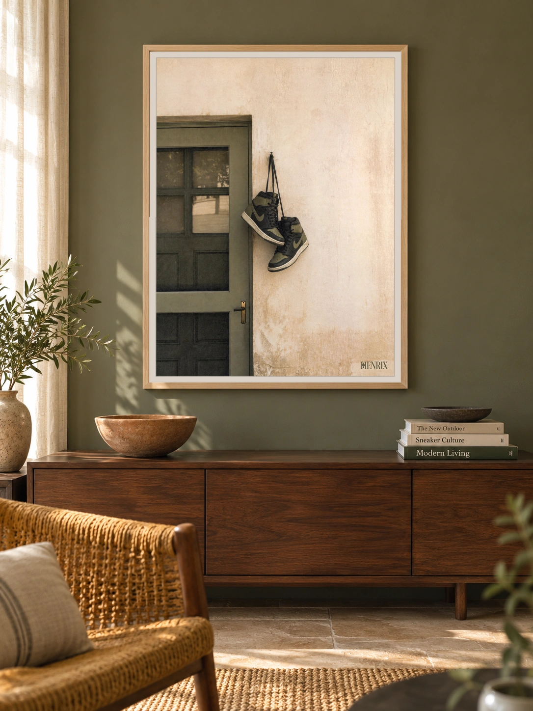Home at Last print, 30 × 40 inch, Natural Wood frame above a wood sideboard on an olive living-room wall