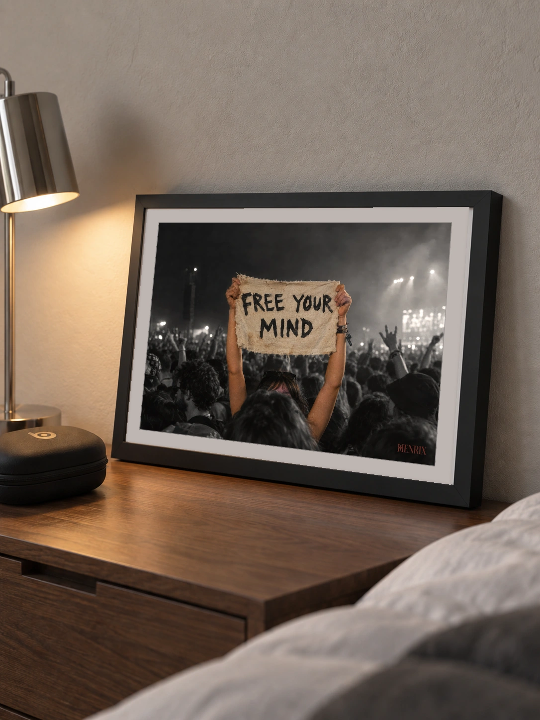 Free Your Mind print, 16 × 12 inch, small black frame leaning on a bedside cabinet