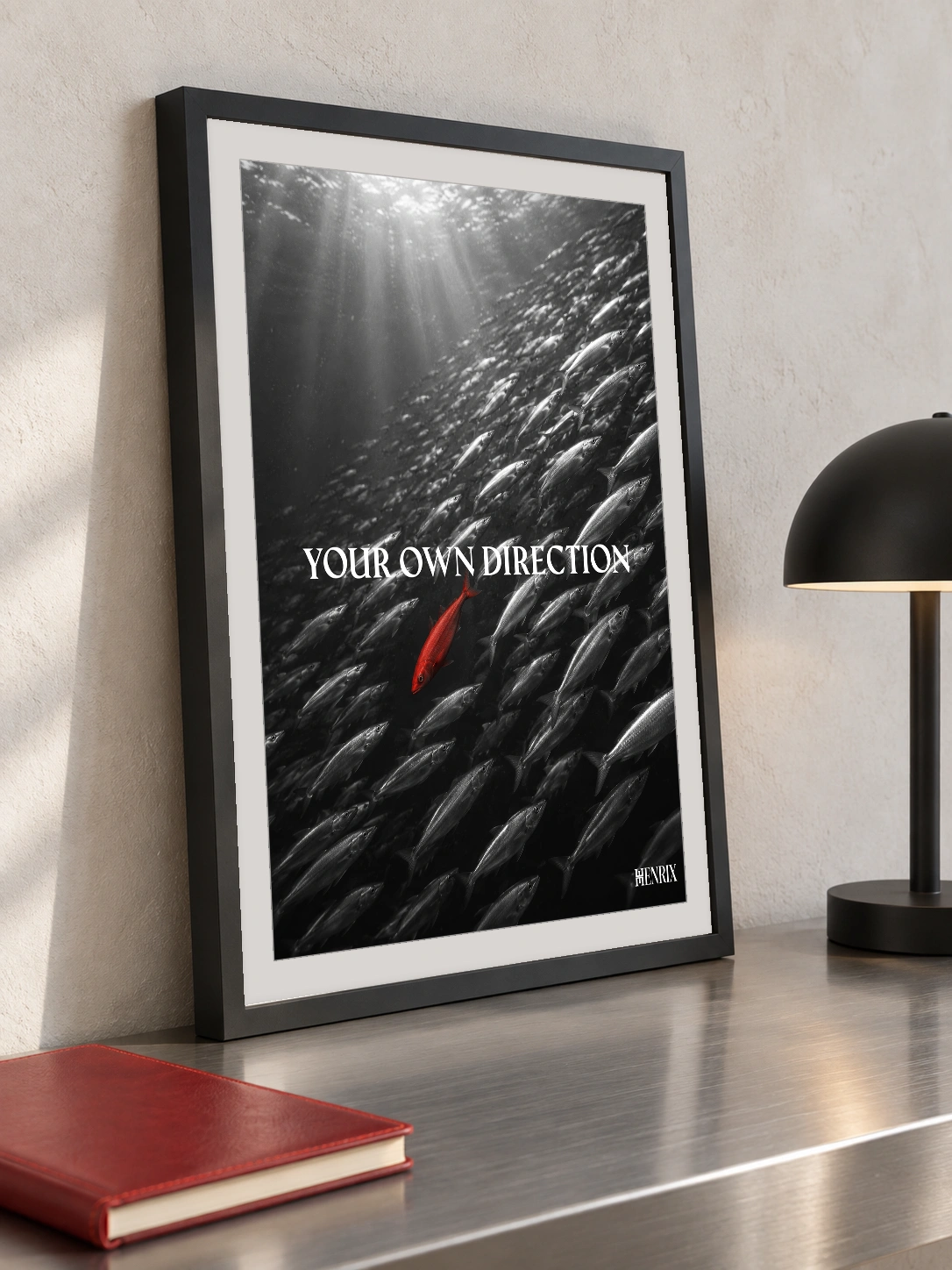 Your Own Direction print, 12 × 16 inch, small black frame leaning on a metal console beside a lamp