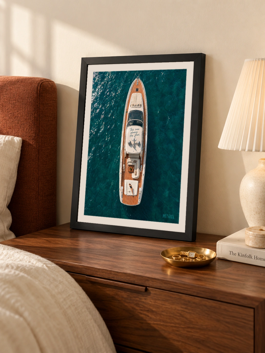 This Was Always the Plan print, 12 × 16 inch, small black frame leaning on a bedside cabinet