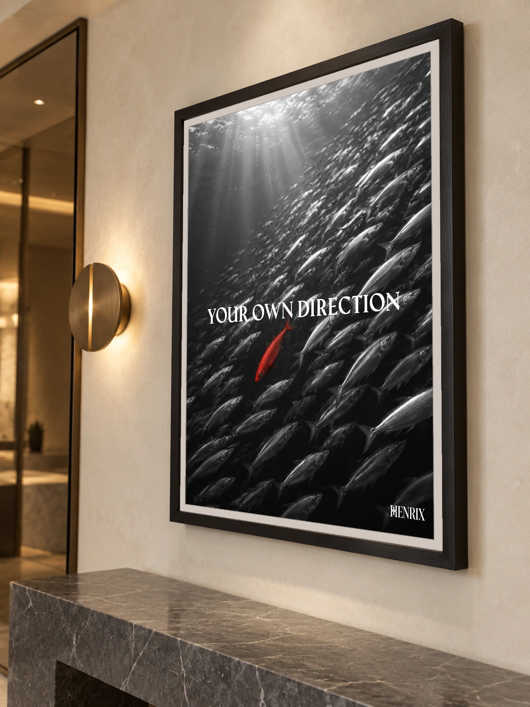 Your Own Direction print, 30 × 40 inch, black frame above a stone entry console, viewed at an angle