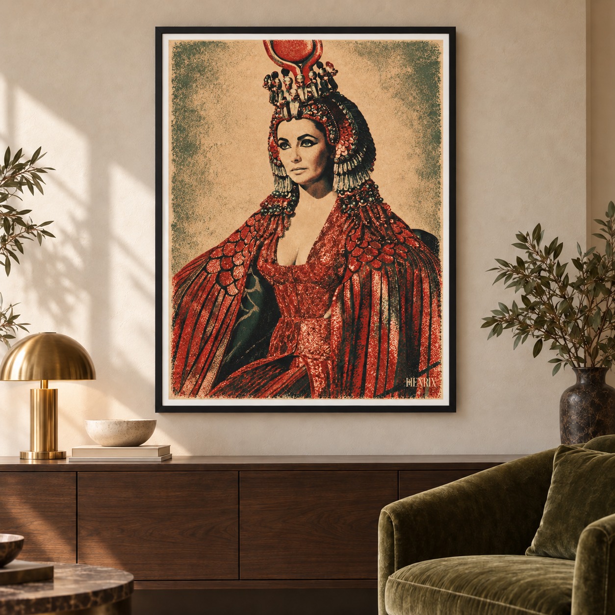 Elizabeth Taylor print by Henrix: a front-facing black frame above a walnut console beside an olive chair
