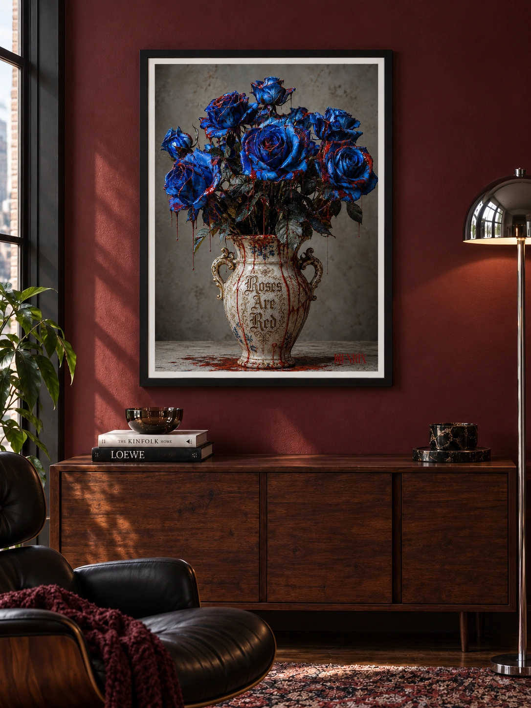 Roses Are Red fine art paper print shown straight on in a black frame above a walnut sideboard against a burgundy wall